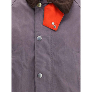 Barbour Waxed Jacket with a corded velvet collar